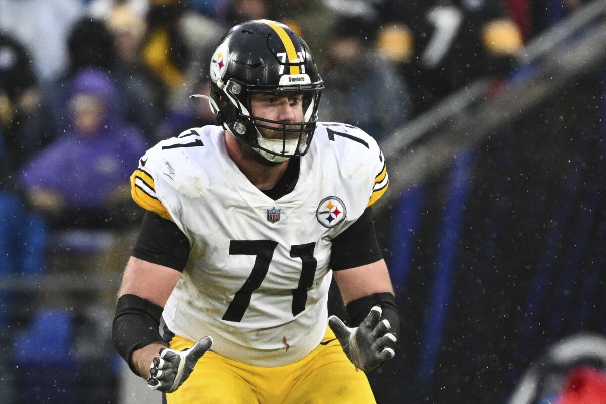 FILE - Pittsburgh Steelers offensive tackle Joe Haeg (71) plays during overtime of an NFL football game against the Baltimore Ravens, Sunday, Jan. 9, 2022, in Baltimore. The Cleveland Browns added depth at two key positions in advance of the season opener, signing offensive tackle Joe Haeg and tight end Jesse James, who both previously played for rival Pittsburgh. The Browns tweaked their roster Monday, Sept. 5, 2022, as they began preparing for Sunday's opener at Charlotte. (AP Photo/Terrance Williams, File)