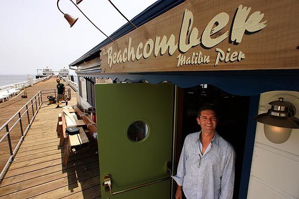 Scully Cloete, general manager of the Malibu Restaurant Group, stands in front of The Beachcomber Cafe, a restaurant scheduled to open July 3 on the Malibu Pier. The building once housed Alice's Restaurant, named after the famous Arlo Guthrie song, which gained fame for serving its legendary B-52 cocktail to droves of visitors.