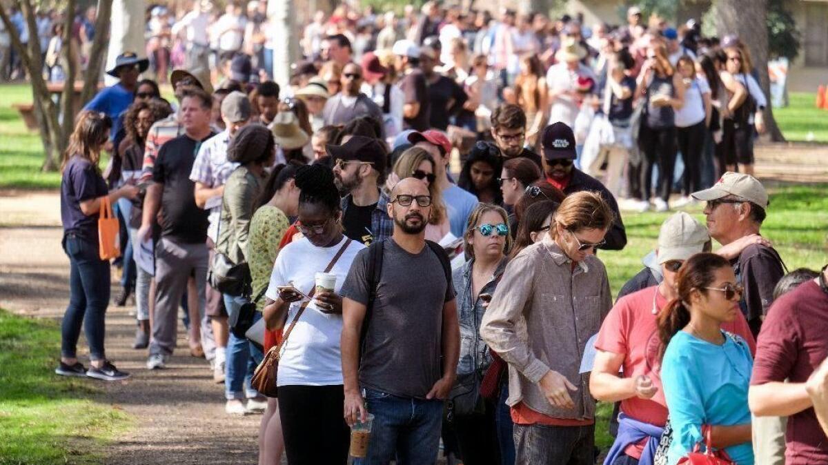 Early voters wait to cast their ballots at a polling station in North Hollywood on Nov. 6, 2016.