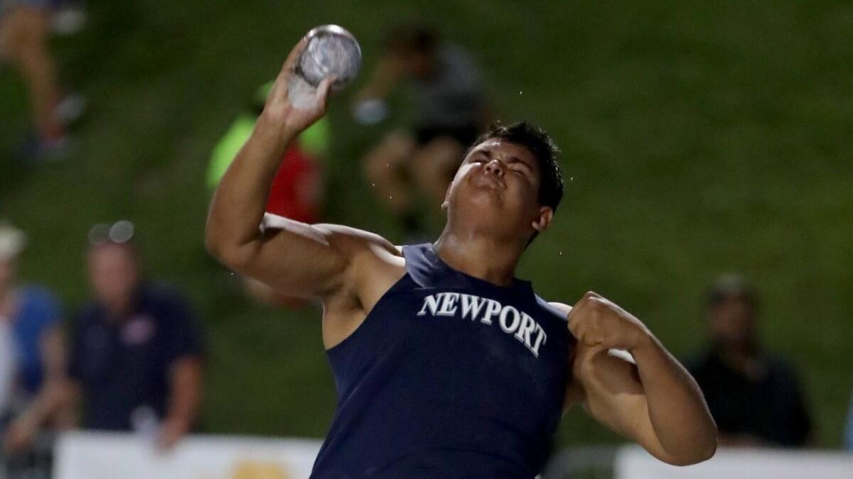 Newport Harbor High sophomore Aidan Elbettar throws in the boys' shotput event during the CIF State track and field championships at Buchanan High in Clovis on June 2. Elbettar placed sixth.