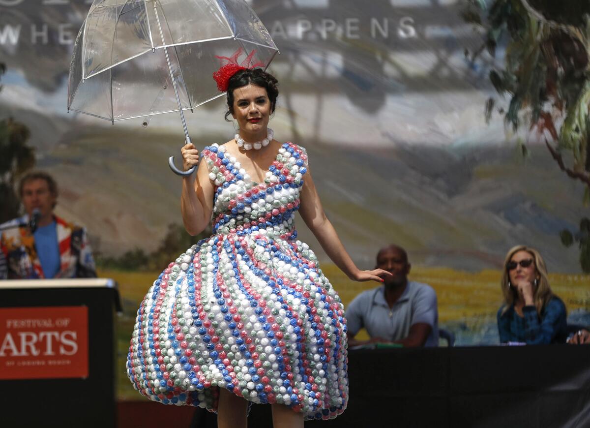 Elizabeth McGhee dons a Bubble Dress she designed at the Festival Runway Fashion Show at the Festival of Arts Sunday.
