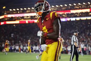 Los Angeles, CA - November 04: USC Trojans Mario Williams celebrates his touchdown reception.