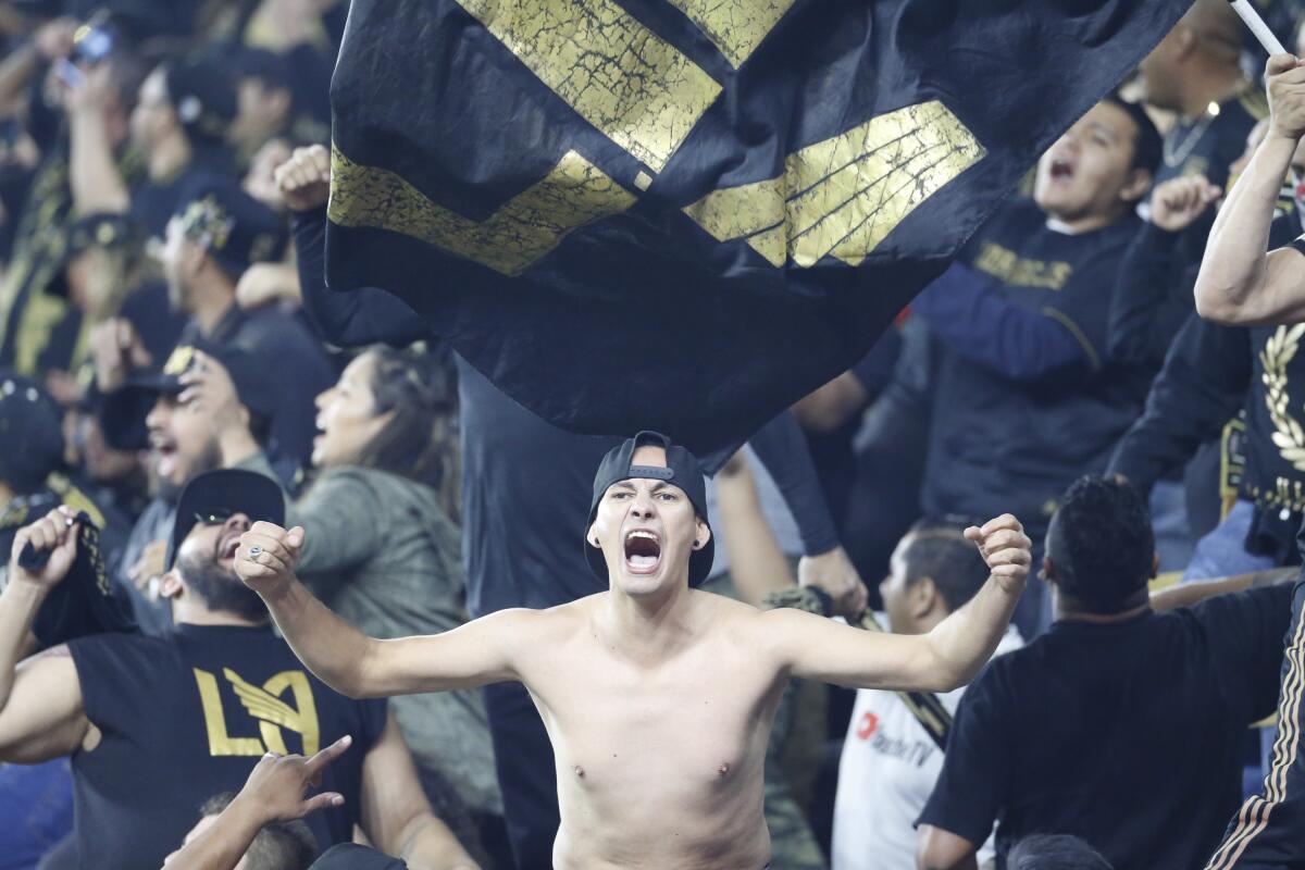 Los Angeles FC fans during the MLS soccer Western Conference final between Seattle Sounders and Los Angeles FC, Tuesday, Oct. 29, 2019, in Los Angeles. Seattle Sounders won 3-1. (AP Photo/Ringo H.W. Chiu)