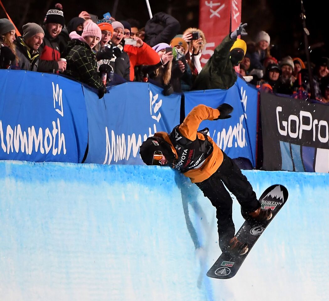 Danny Davis hits his head while landing on the halfpipe in the Men's Halfpipe Finals competetion in Mammoth Mountain.