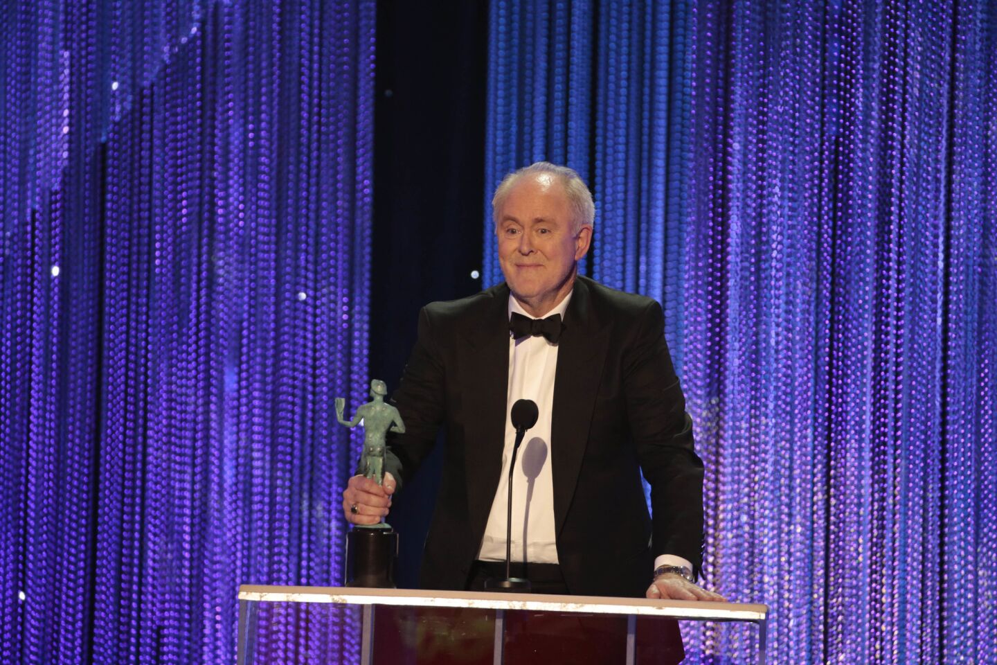 John Lithgow wins male actor in a drama series for "The Crown."