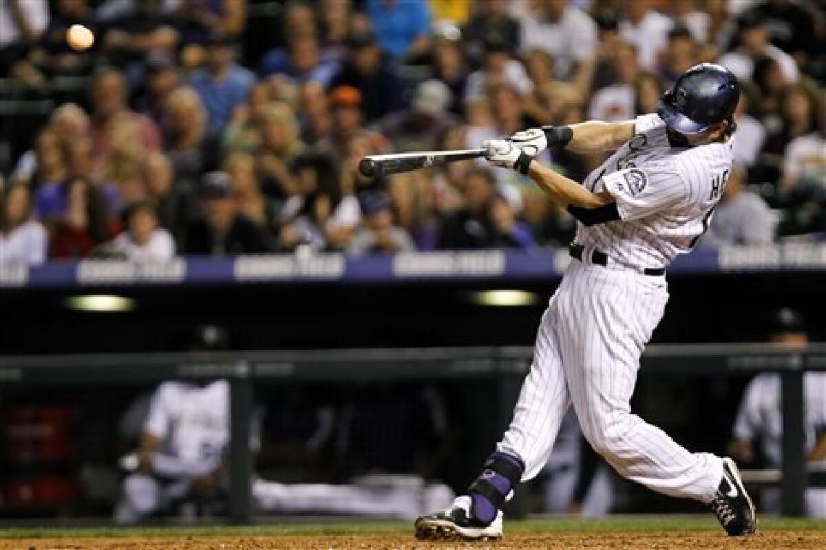 Helton hits 2 HRs, drives in 6 as Rockies top Reds - The San Diego  Union-Tribune