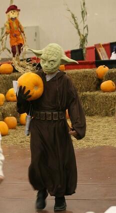 Steven Plyler, Jr., dressed as Yoda from Star Wars, during the Spooktacular Family Fiesta in El Paso, Texas.