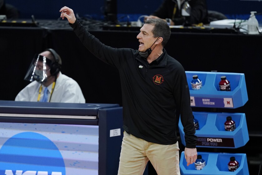 Maryland head coach Mark Turgeon directs his players during the second half of a college basketball game against Alabama in the second round of the NCAA tournament at Bankers Life Fieldhouse in Indianapolis Monday, March 22, 2021. (AP Photo/Mark Humphrey)