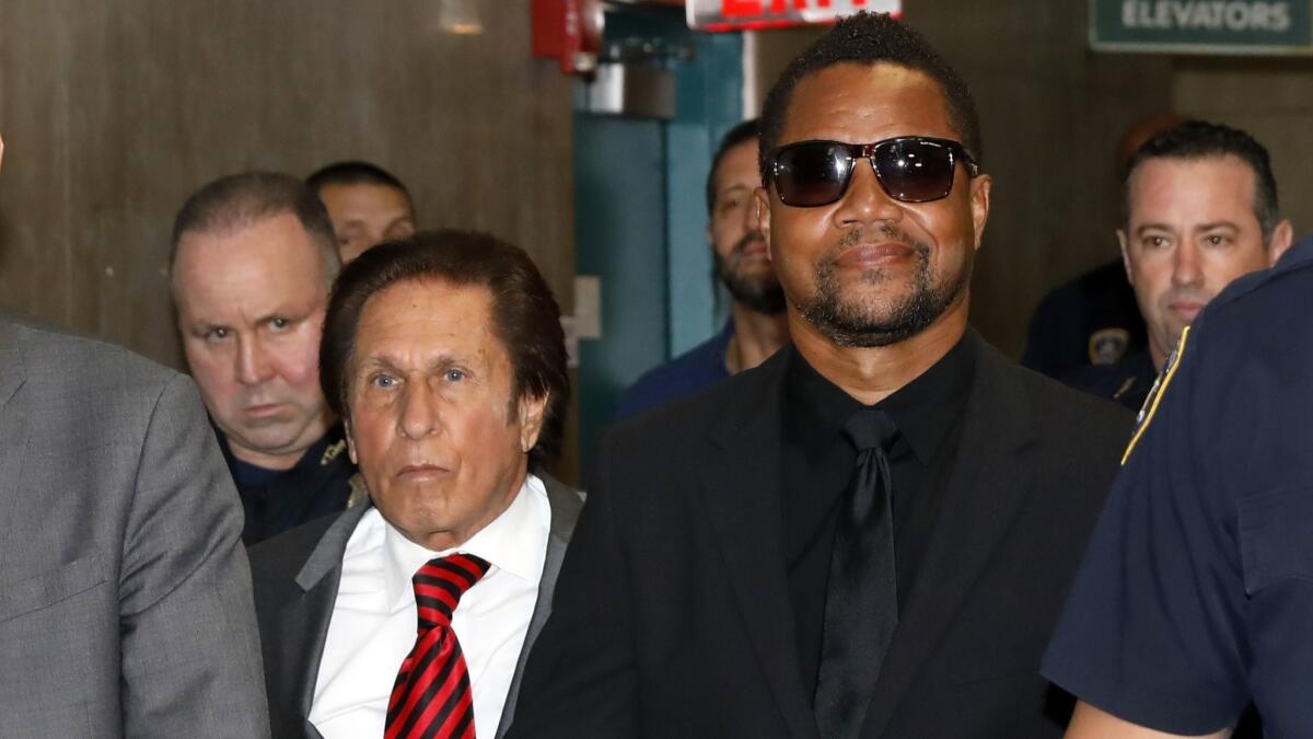 Cuba Gooding Jr., right, with his attorney Mark Heller, arrives at criminal court in New York on Wednesday.