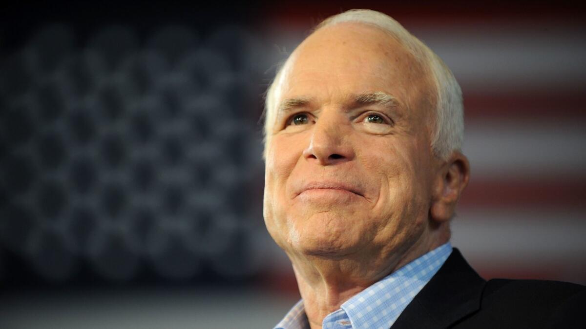 The late Sen. John McCain, shown during the 2008 presidential campaign, was revered for his personal courage and his old-fashioned civility in political battle. He died Saturday at age 81.
