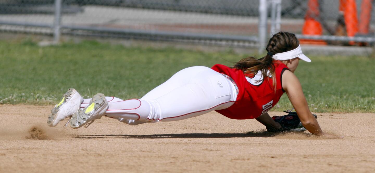 Photo Gallery: Burroughs High School softball breaks game wide open vs. Crescenta Valley High School at top of fifth inning