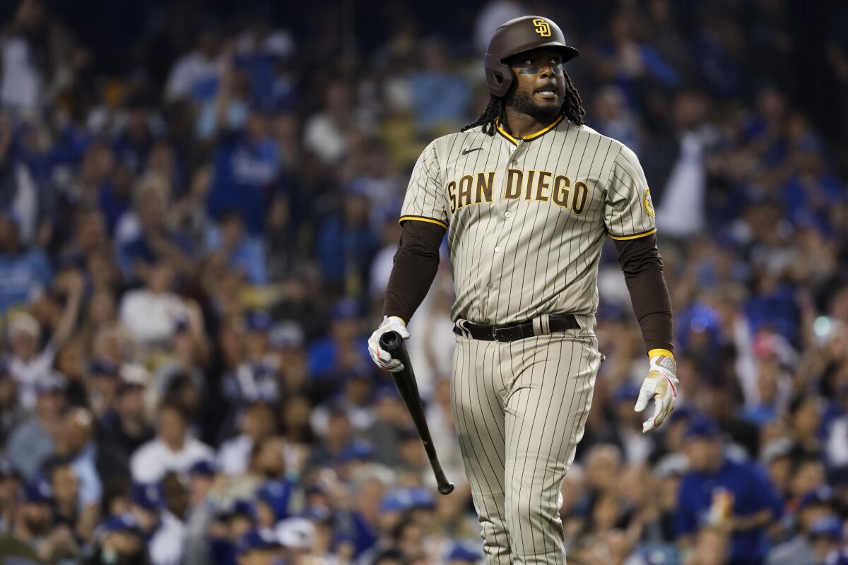San Diego Padres' Josh Bell reacts after striking out during the sixth inning of game one of the NLDS.