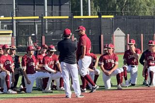 Oaks Christian coach Royce Clayton addresses his team after 4-1 win over Calabasas