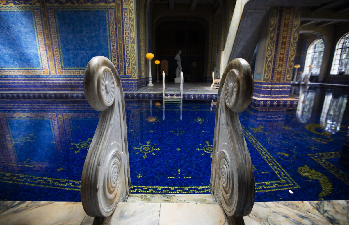 The Roman Pool at Hearst Castle. It is a tiled indoor pool decorated with eight statues of Roman gods, goddesses and heroes. 