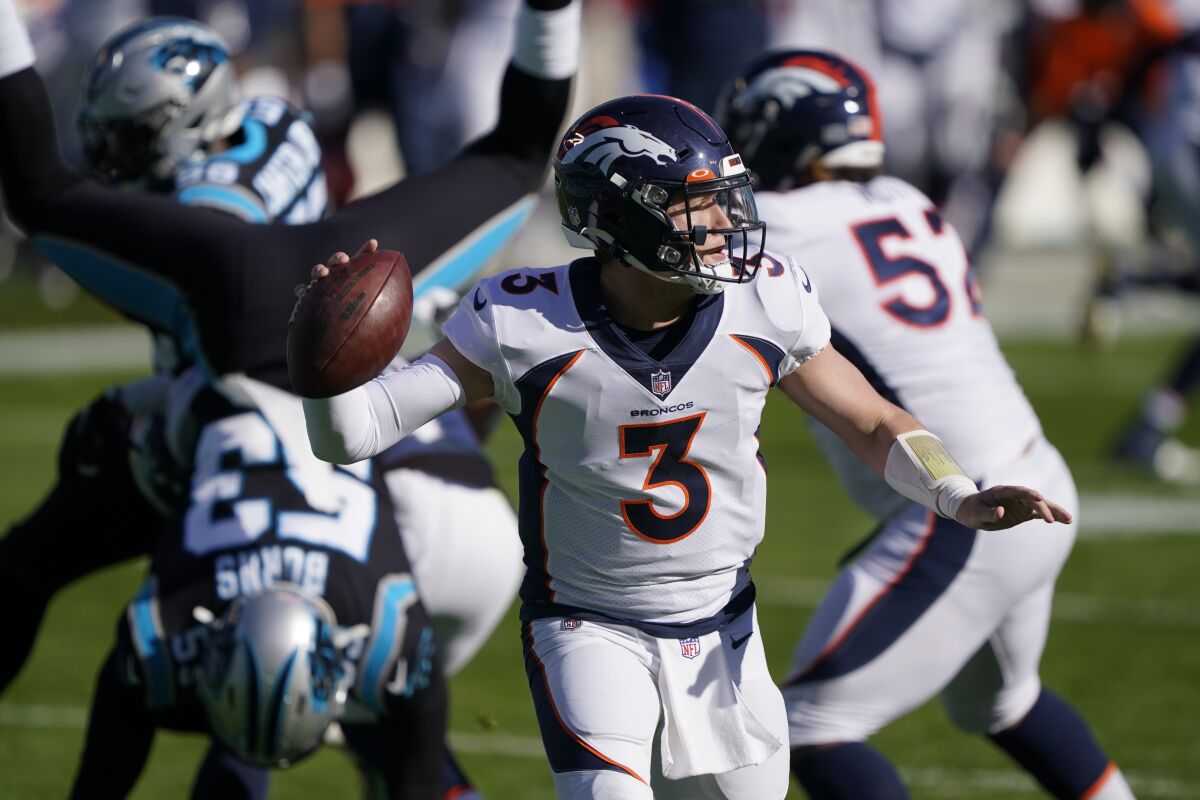 Denver Broncos quarterback Drew Lock passes against the Carolina Panthers.
