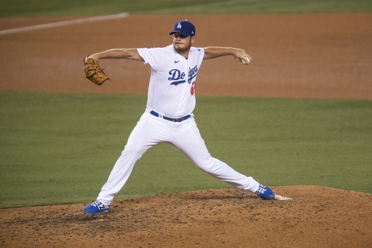 Dodgers relief pitcher Caleb Ferguson delivers during a game.