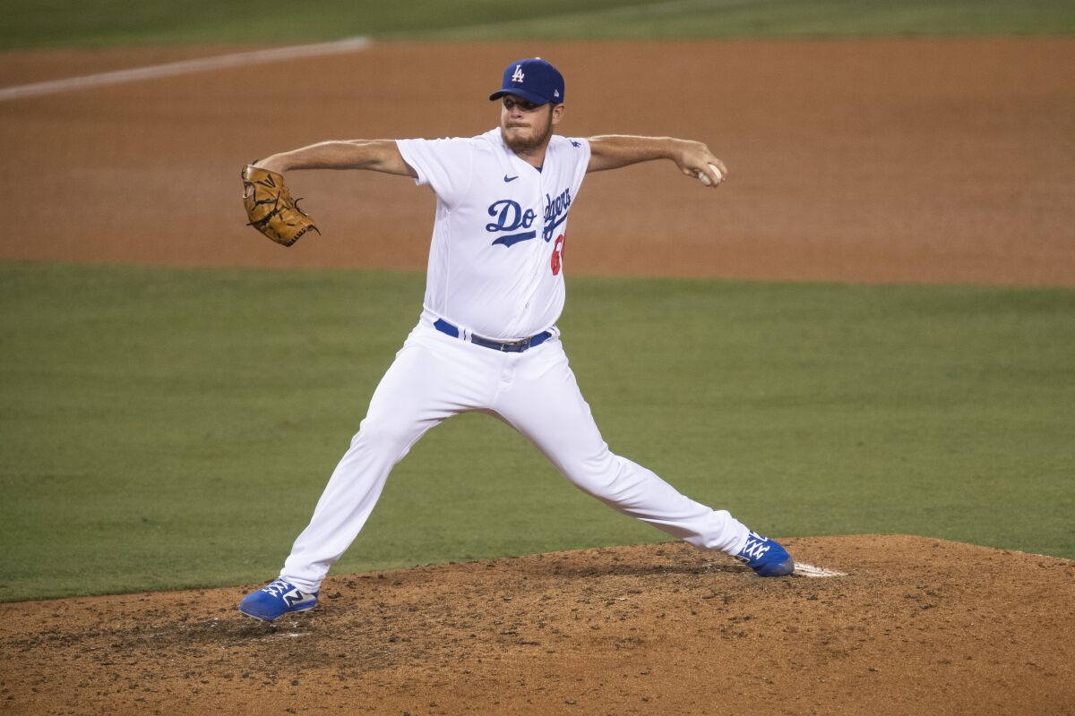 Dodgers relief pitcher Caleb Ferguson delivers during a game.