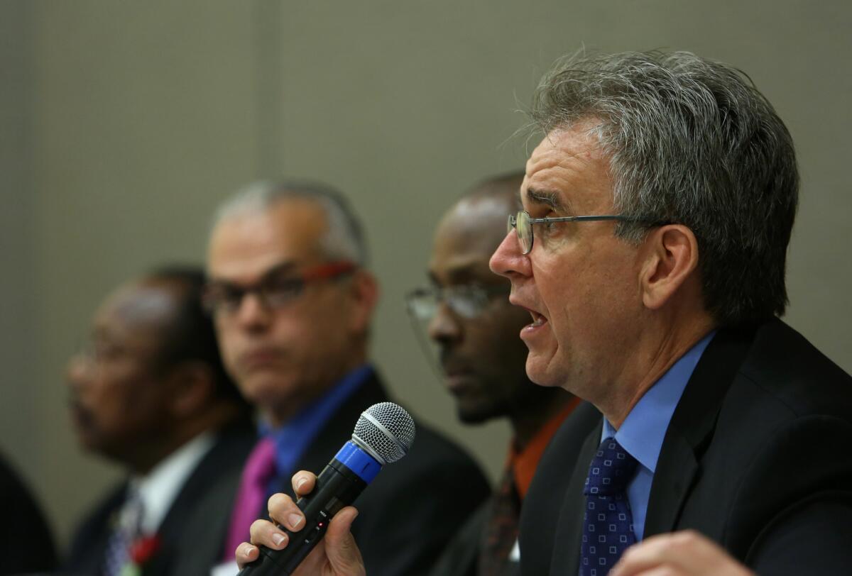 Warren Fletcher, right, is president of United Teachers Los Angeles, though he gained less than a quarter of the votes needed to secure a second term. Above, he speaks during a candidates forum in Boyle Heights.