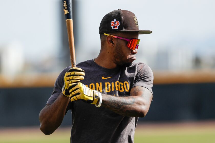 Peoria, AZ - February 19: Padres right fielder Jose Azocar (28) waits before batting practice during a spring training practice at the Peoria Sports Complex on Sunday, Feb. 19, 2023 in Peoria, AZ. (Meg McLaughlin / The San Diego Union-Tribune)