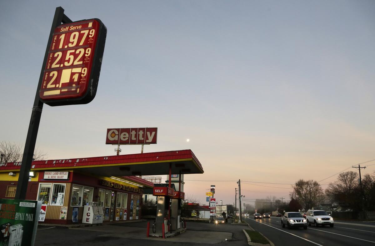 The price of unleaded regular gas was $1.97 at a gas station in Newark, Del., last month.