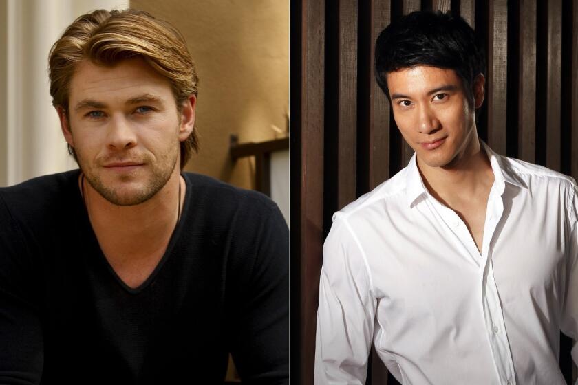 Actor Chris Hemsworth and Chinese pop singer Leehom Wang, stars of a forthcoming Michael Mann thriller.