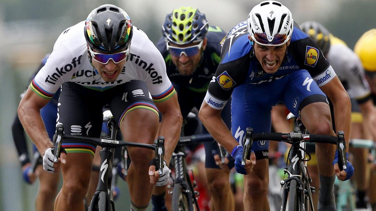 Peter Sagan edges Julian Alaphilippe to win the second stage of the Tour de France on Sunday.