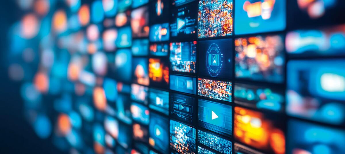 Wall Of Digital Screens With Video Content And User Interface Elements