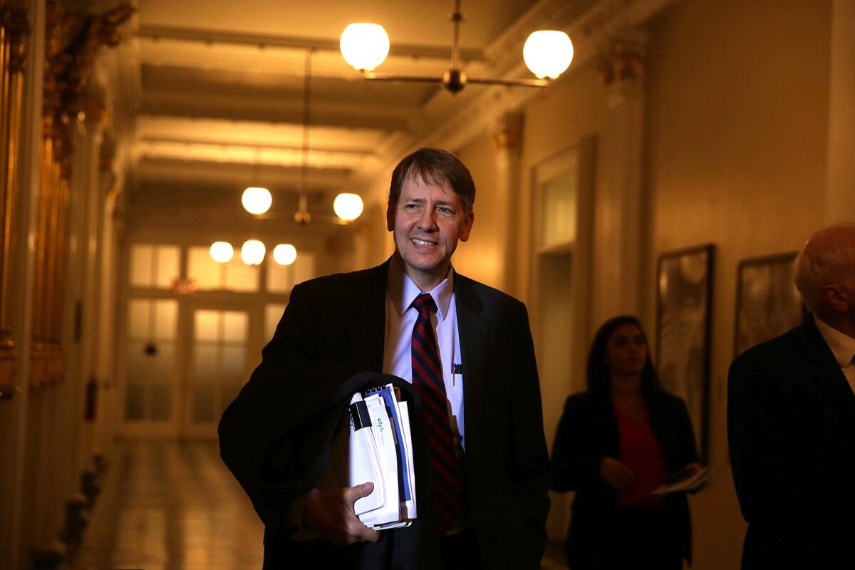 Richard Cordray, director of the Consumer Financial Protection Bureau, arrives at a meeting at the Treasury Department in November.