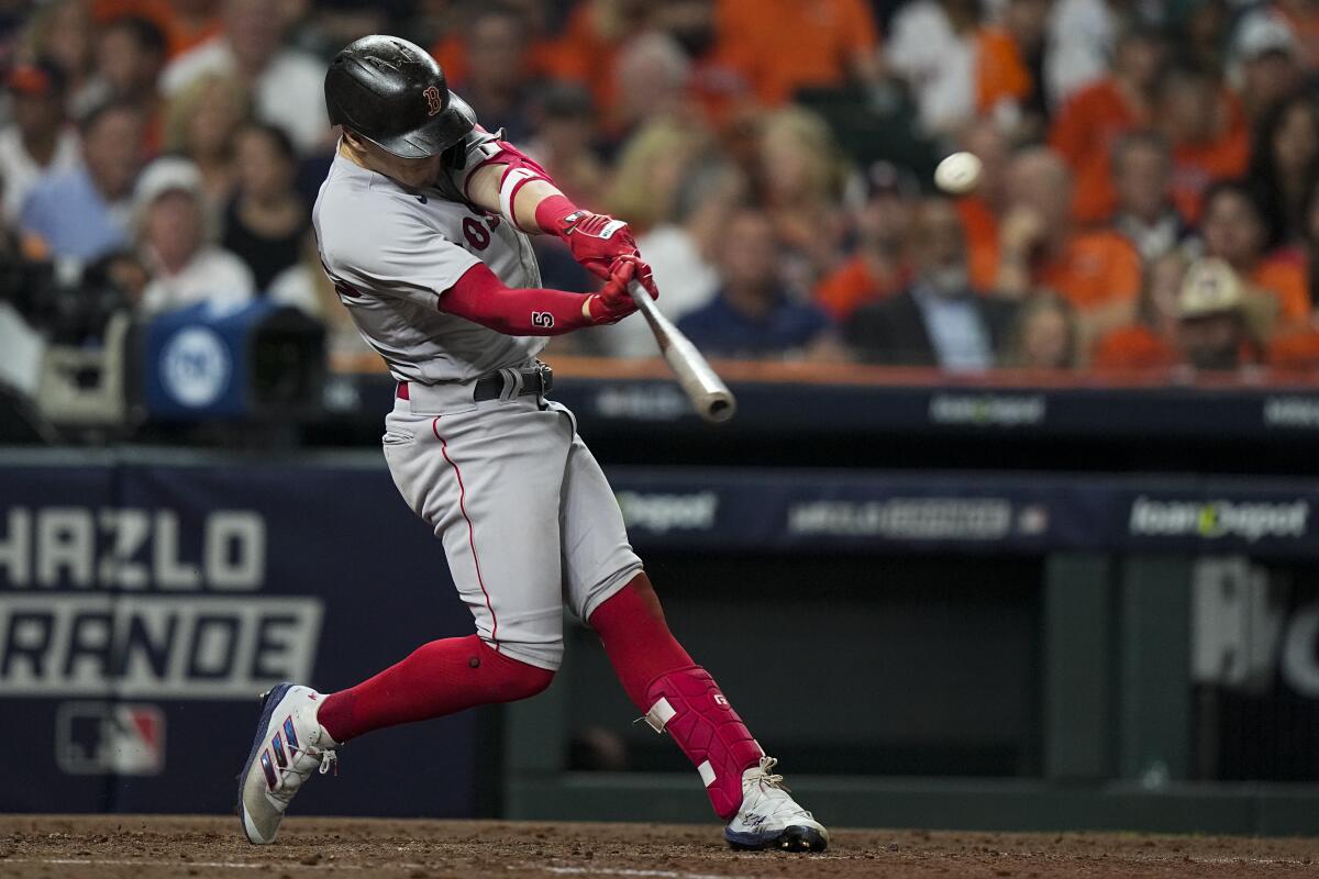 The Red Sox's Kiké Hernandéz, an ex-Dodger, hits a third-inning home run in Game 1 of the ALCS.