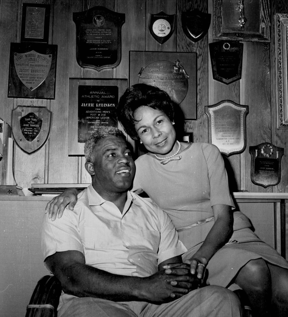Jackie Robinson and his wife, Rachel, pose in their Connecticut home in 1962.