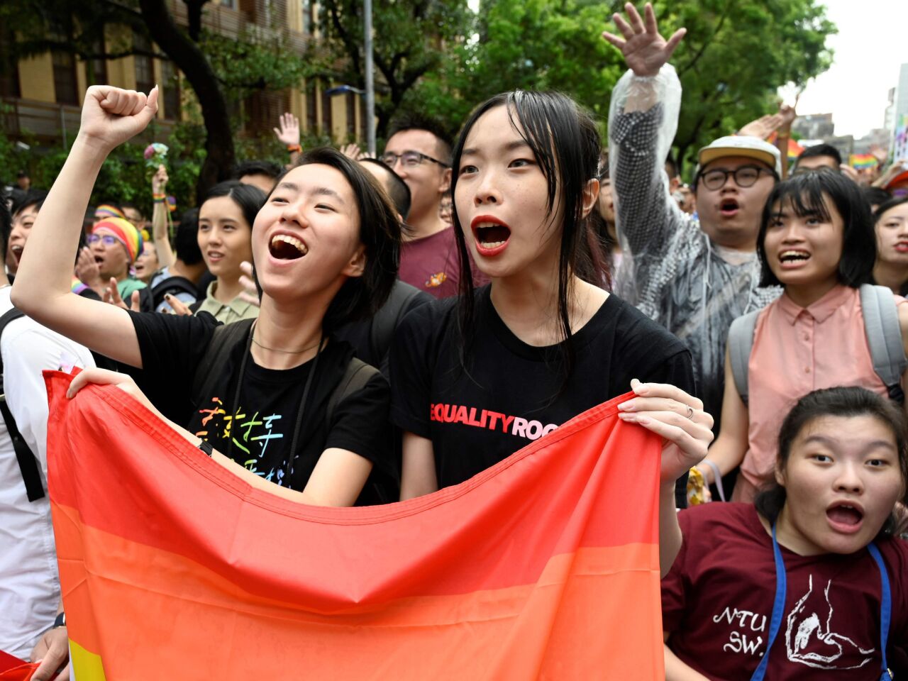 Supporters of same-sex marriage celebrate outside the parliament in Taipei, Taiwan.