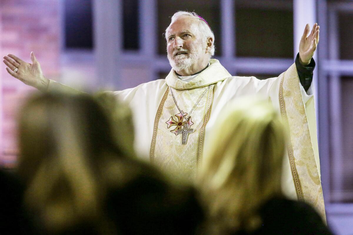 Auxiliary Bishop David O'Connell speaks during a service.