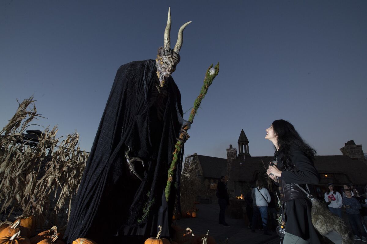 Alexa Gutierrez, 21, of Saratoga Springs, Utah, summons information from the Fae King at Evermore.