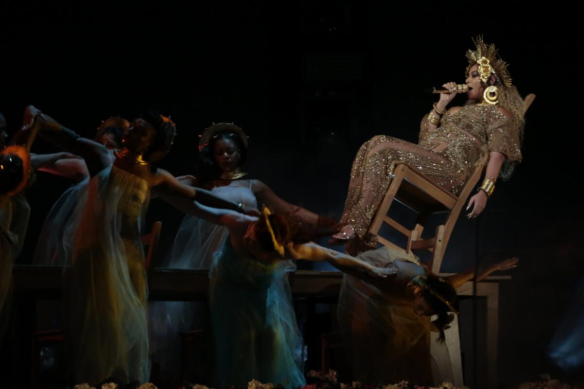 Beyonce's performance with chair assist at the 59th Annual Grammy Awards.