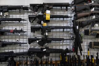 AR-15-style rifles are on display at Burbank Ammo & Guns in Burbank, Calif., Thursday, June 23, 2022. (AP Photo/Jae C. Hong)