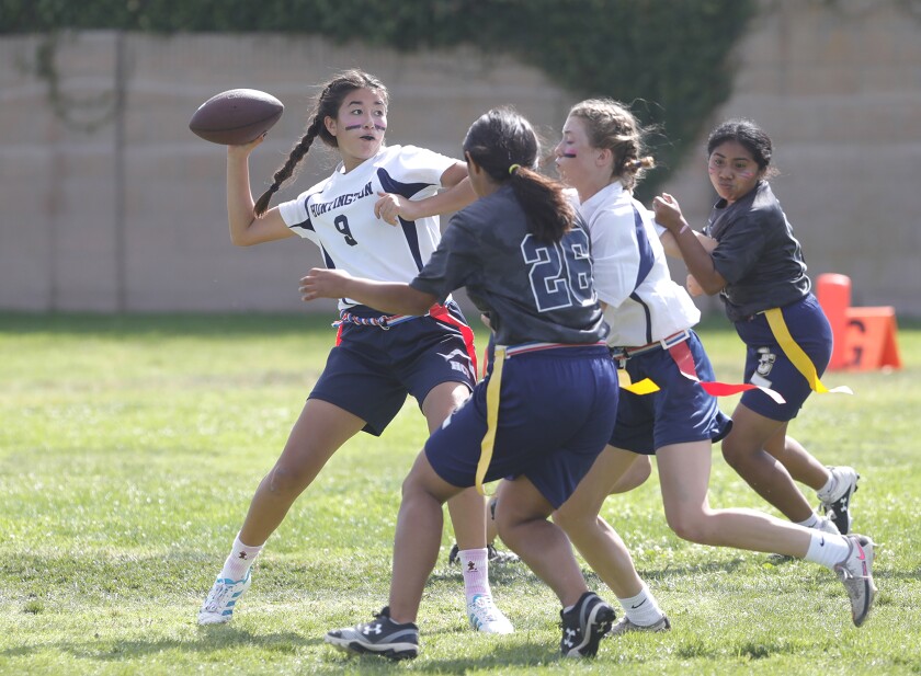 Huntington Christian quarterback Maddy Drotter throws to sister Morgan.