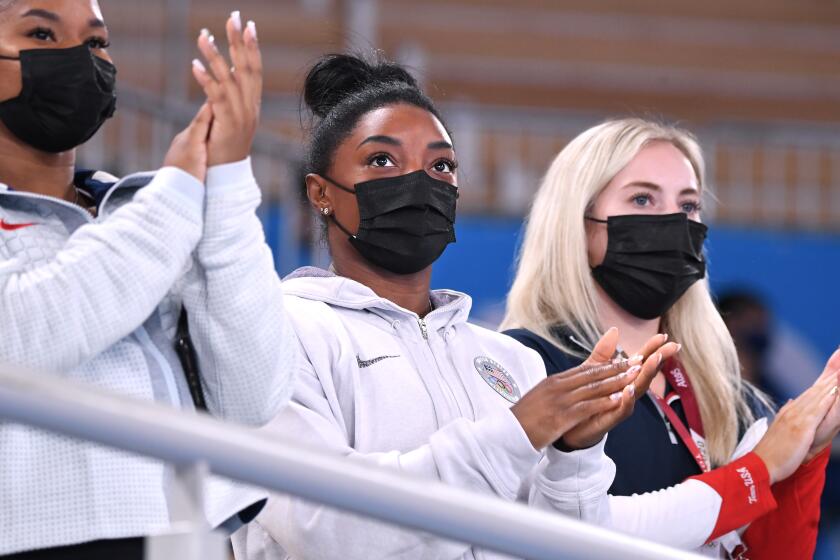 -TOKYO,JAPAN July 29, 2021: USA's Simone Biles applauds from the seats.