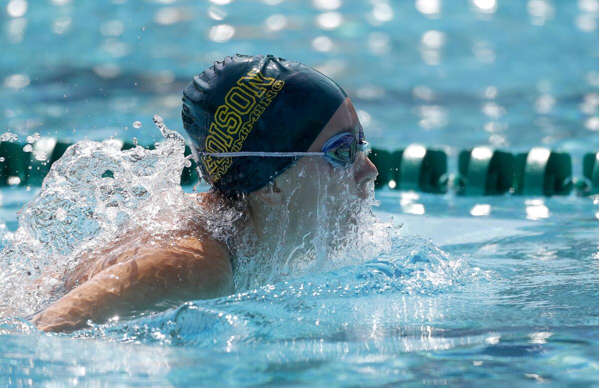 Edison's Gaby Kelly swims the breaststroke in the girls' 200 individual medley during the Wave League swim finals Thursday.