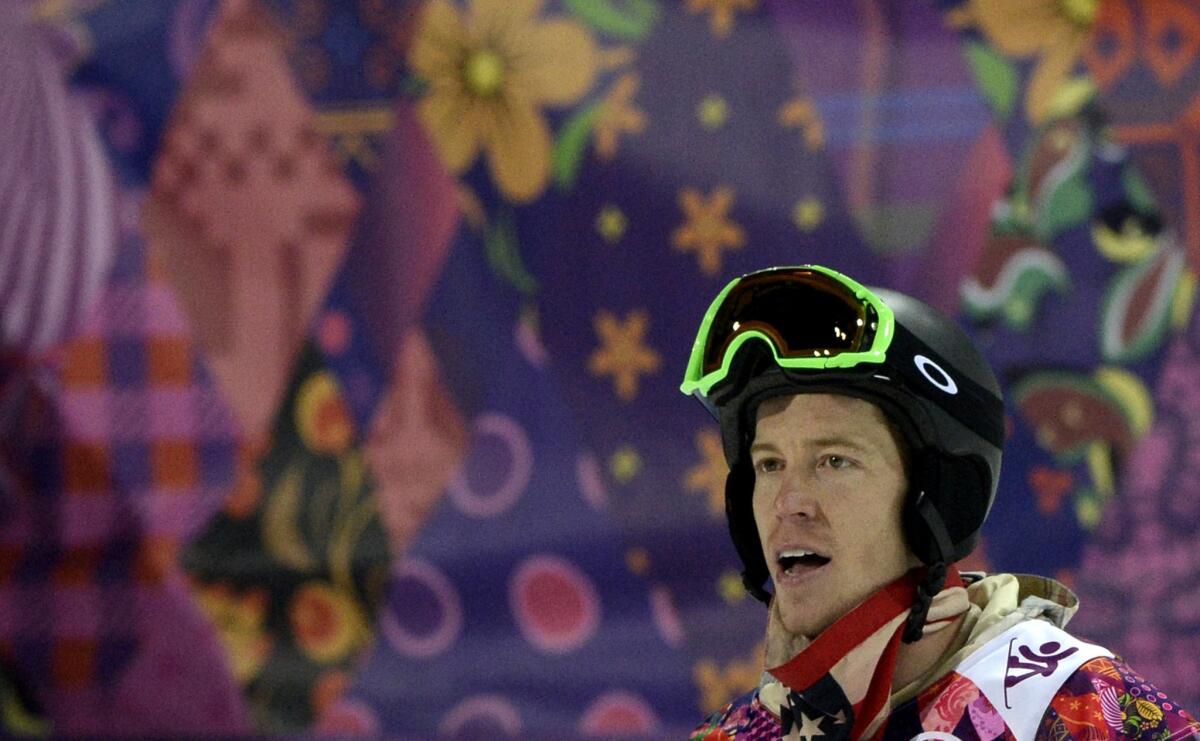 U.S. snowboarder Shaun White waits at the finish line of the men's halfpipe final at the Rosa Khutor Extreme Park in Sochi, Russia, on Tuesday. More than 600,000 people watched his fourth-place performance on a digital device.