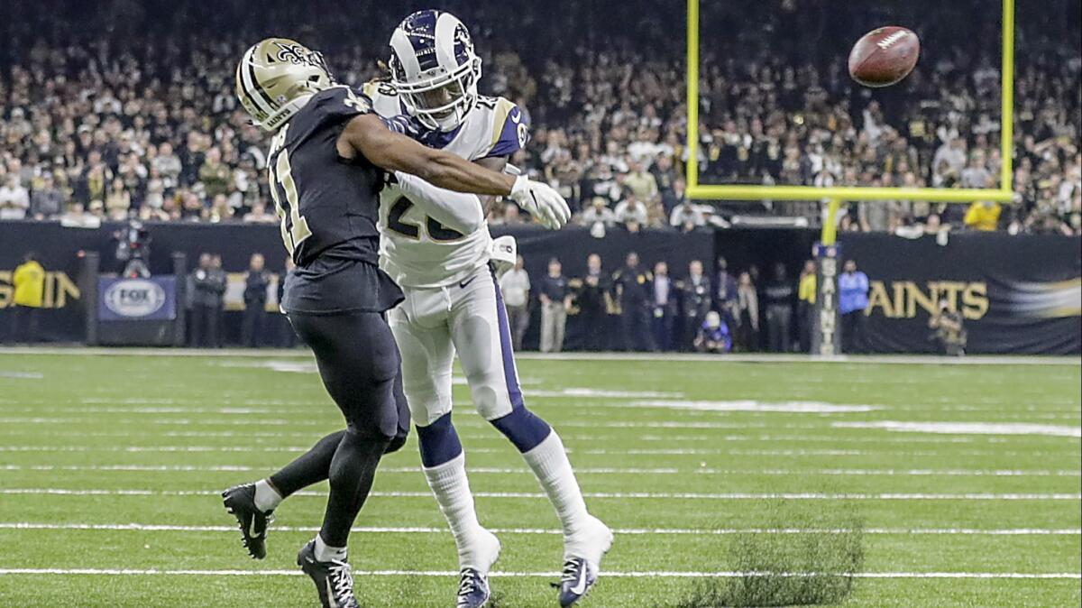 Rams cornerback Nickell Robey-Coleman seems to deliver an early hit to  New Orleans Saints receiver Tommylee Lewis late in the fourth quarter, thwarting a potential game-winning drive in the NFC Championship at the Superdome last season.