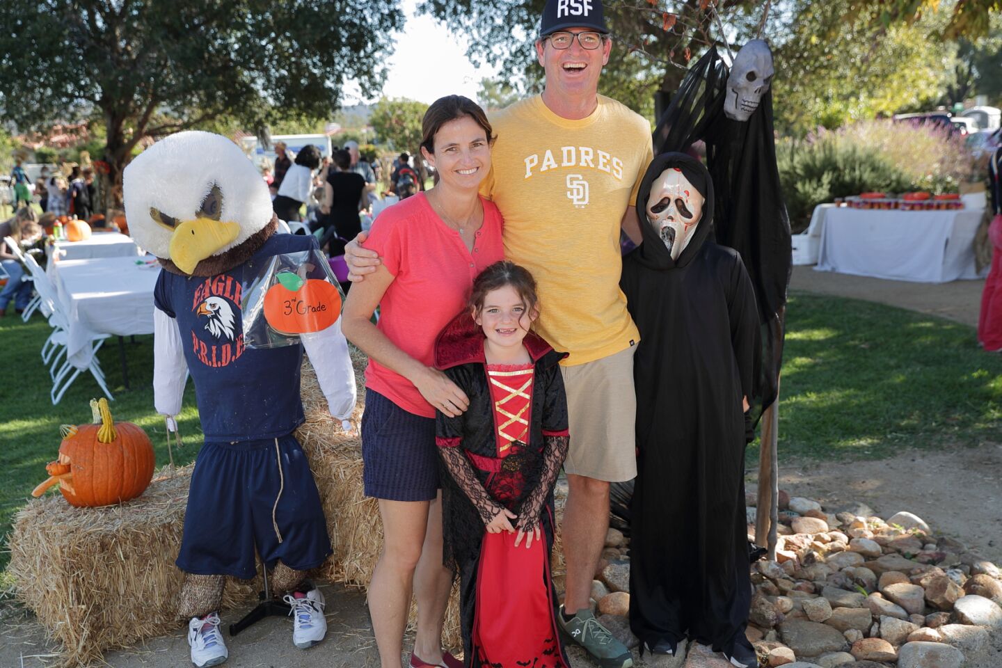 The Moreland family with the 3rd Grade Scarecrow