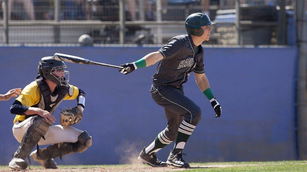 Sage Hill School's Conner Bock bats in a runner during the first inning against Crean Lutheran.