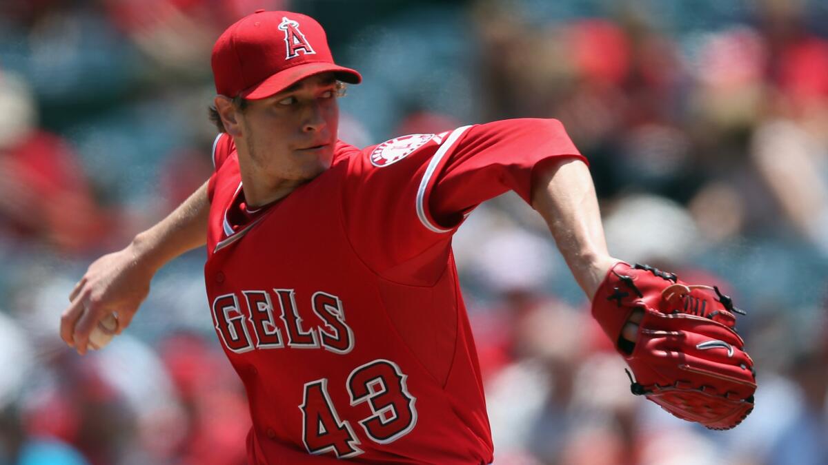 Angels starter Garrett Richards delivers a pitch during the team's 4-3 win over the Kansas City Royals on Sunday afternoon.
