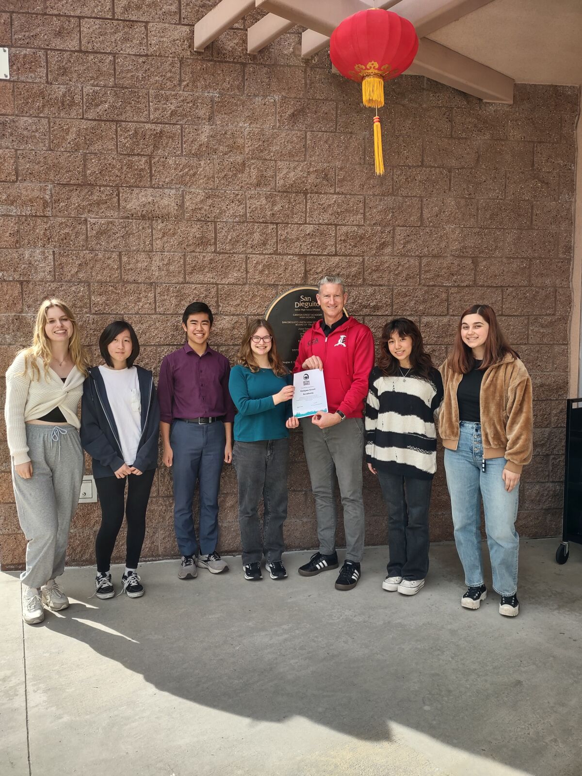 CCA students in the fair trade campaign with Principal Brett Killeen after their fair trade recognition.
