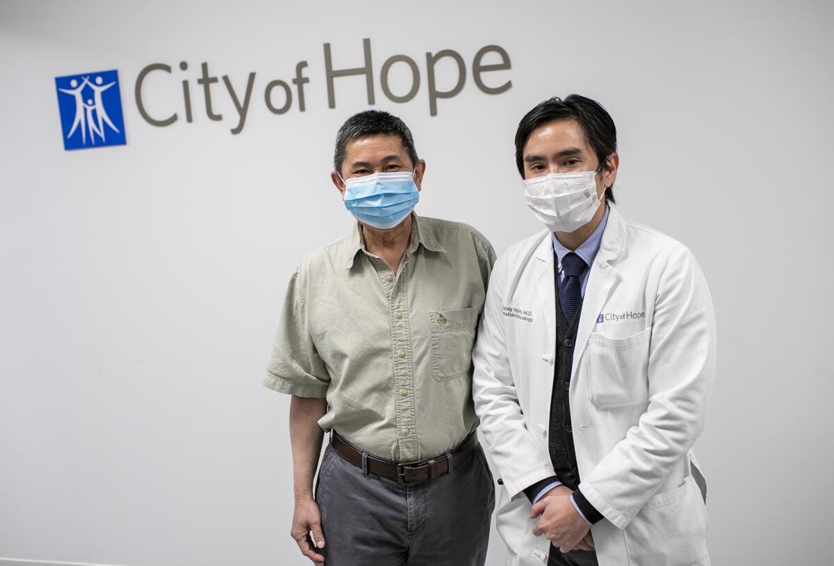 John Ryan, a 59-year-old Vietnamese American, left, and Dr. Danny Nguyen, a medical oncologist and hematologist.