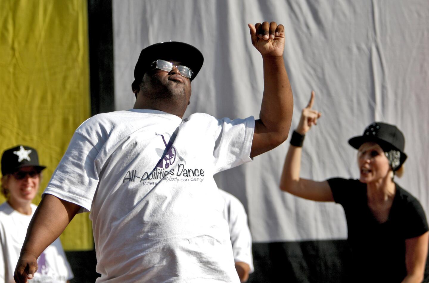 John Tucker, 28 of L.A., dances during performance by Burbank's All Abilities Dance group, at the 37th annual Very Special Arts Festival at the Music Center in Los Angeles on Friday, October 23, 2015.