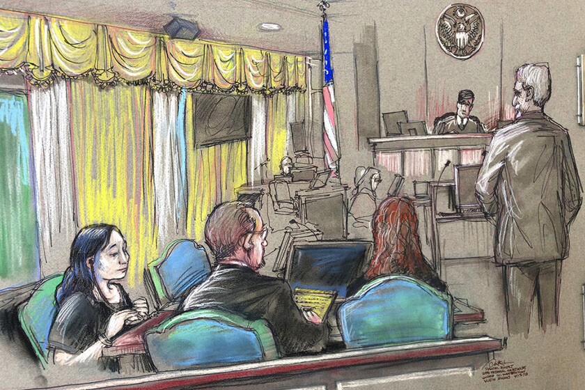 In this April 15 courtroom sketch, Yujing Zhang, left, a Chinese national charged with trespassing at President Trump’s Mar-a-Lago resort, listens to a hearing before Magistrate Judge William Matthewman in West Palm Beach, Fla.