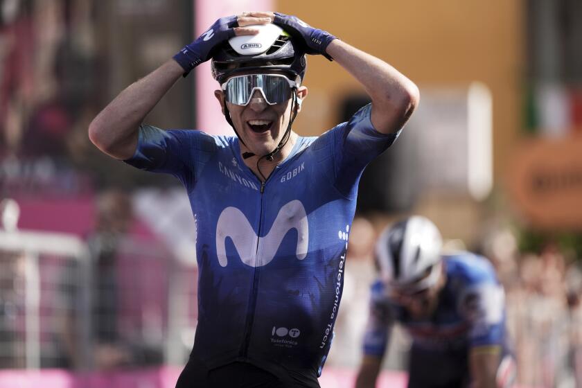 Spain's Pelayo Sanchez celebrates winning the sixth stage of the of the Giro d'Italia, Tour of Italy cycling race, from Viareggio to Rapolano Terme, Italy, Thursday, May 9, 2024. (Massimo Paolone/LaPresse via AP)
