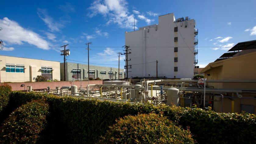 Affordable housing could be built on a site that is home to an oil drilling facility on Washington Boulevard in L.A.'s Arlington Heights neighborhood, officials say.