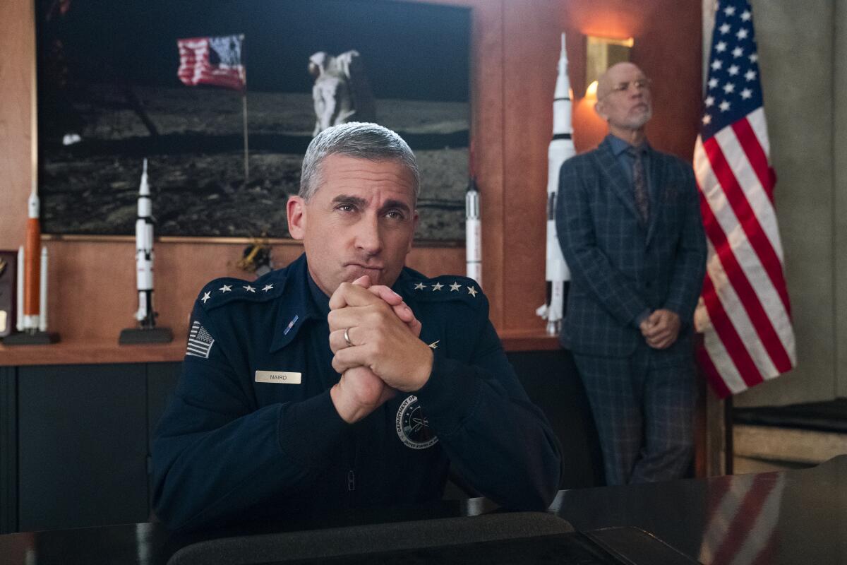 Steve Carell, left, and John Malkovich star in the Netflix series "Space Force."